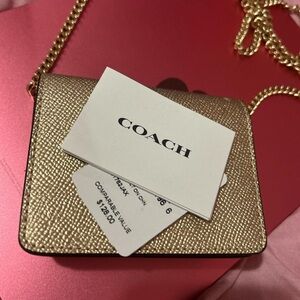 Gold mini coach crossbody